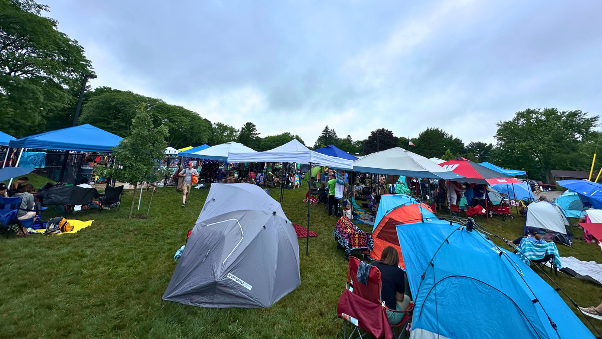 Swim meet with families in tents